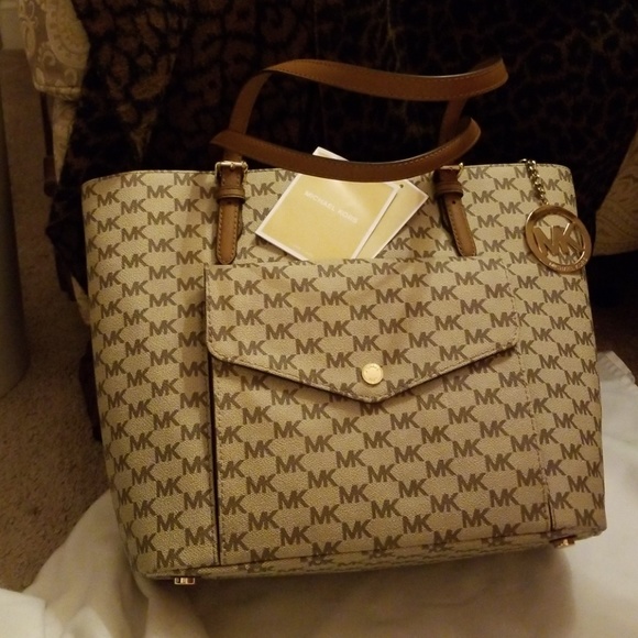 Michael Kors Handbags - LARGE Michael Kors Brown Signature Handbag